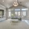 a large living room with a fireplace