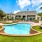 a large house with a swimming pool