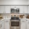 a kitchen with white cabinets