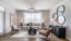 a living room with a large mirror